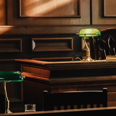 Courtroom with green lamp and light beam
